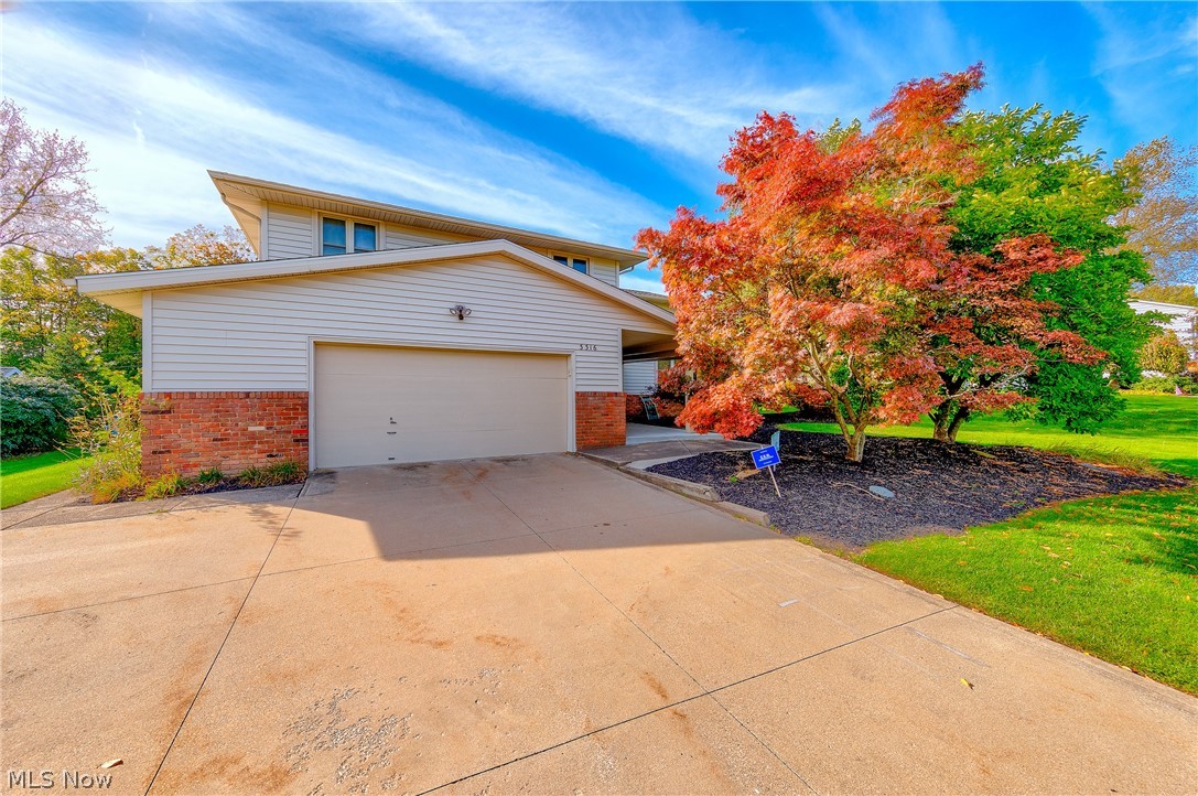 Stunning 4 Bedroom/3.1 Bath Contemporary Styled Split-level Home on a desirable dead end street in Beachwood. Open concept, the light floods this Home by way of Large replacement Windows plus soaring Vaulted Ceilings. So many great updates throughout! Family Room addition added with Vaulted Ceilings, a wood burning Fireplace, Custom Built-Ins & Sliders that open to a beautiful Stone Patio & large Custom Built Rear Deck that is accessed off the Kitchen. Updated Kitchen (2010 ) w/ Custom Cabinets, Granite Counter Tops, Slate backsplash & Opens to the Family Room featuring a stunning glass block transition.Newer Roof (2016) Newer windows (2008) & Waterproofing in 2005 with a transferable Warranty. Second Floor Features 4 Bedrooms Including Master Bedroom w/ Vaulted Ceilings, Master Bath with Ceramic Tile, Double Sinks, Large Jacuzzi Tub & separate Shower. There's another updated Hall Full Bathroom with Ceramic Tile & Granite counters & a Third Full Bathroom off the 4th Bedroom. There's a