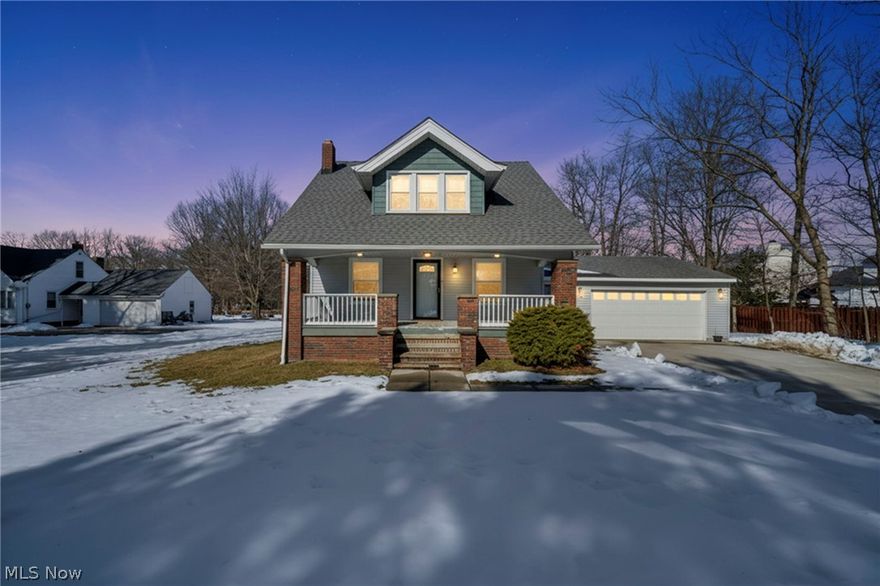 Welcome home to a beautiful three-bedroom, two-full-bath Richmond Heights Cape Cod offering charm paired with extensive modern improvements. Situated on a private lot set back from the street, gracious outdoor space including a (2) car garage, long driveway and inviting front porch — providing both privacy and curb appeal. This home offers a spacious living room with a cozy fireplace, formal dining room perfect for entertaining. Updated kitchen with modern countertops, all appliances included, updated flooring, and stylish backsplash. Two nicely updated full bathrooms, first-floor full bath & first-floor laundry for added functionality.  The unfinished basement adds valuable additional living space — ideal for a future recreation room, home office, entertainment area & storage — complete with glass block windows for security, efficiency, and natural light. Additional updates include: roof, driveway, garage, updated electrical, furnace, plumbing, hot water tank & central air. The third-floor walk-up offers incredible flexibility for additional storage & bonus space. Don't miss the opportunity to call this property Home!