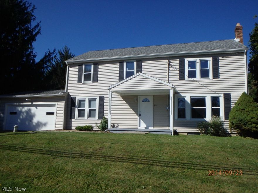NEW Stainless Steel Appliances going in 11/26/14! Completely remodeled 4 bedroom colonial located Just off of 532/Mogadore Road and 224. New kitchen with Stainless Steel appliances and granite counter tops. Family Room has a fireplace and there is an additional living room for extra company. 1st Floor laundry room and 1st floor full bathroom are new too. This home has a finished 2 car garage with built in shelving and workshop. The Homes mechanical systems are all new too. New Furnace, A/C, Electrical, Plumbing, hot water tank and stainless steel appliances.  Just minutes from schools, parks, shopping and 224. This home is all new and move in ready. Call today for a private showing before it is gone.