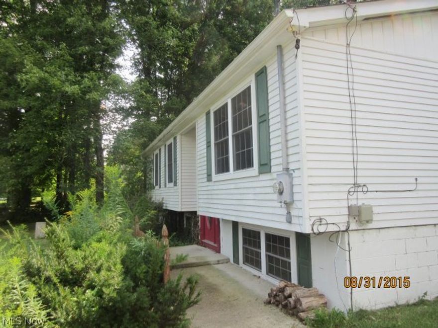 Nice 3 bedroom, 2 bath, bi-level, 2 car detached garage, deck and more on 1.8 acres