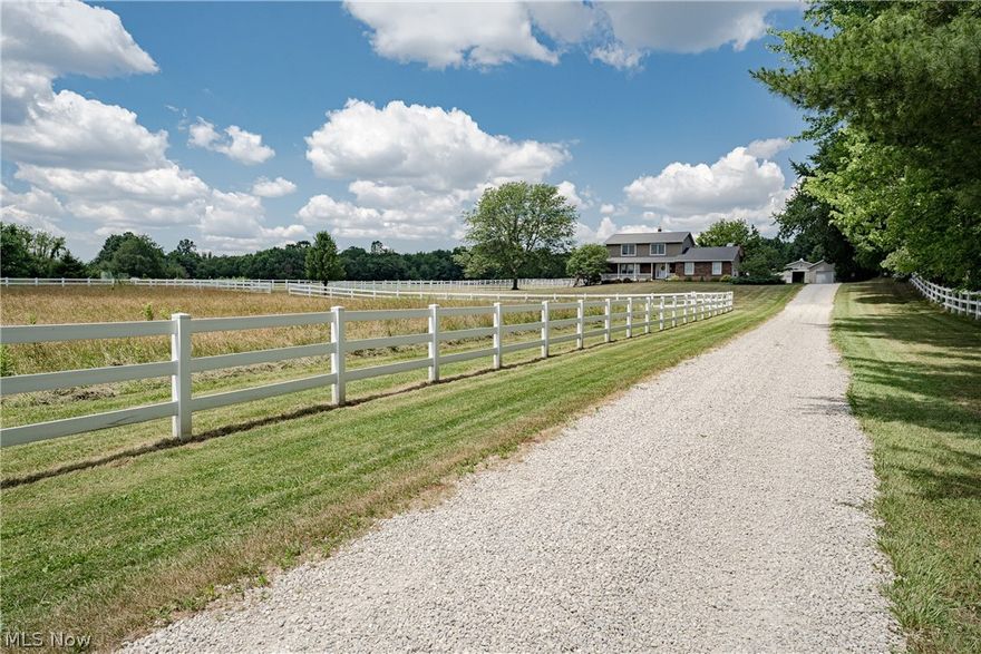 Welcome to this picturesque horse property in Uniontown. This five acre property includes a 3-stable horse barn, 3 pastures, and a beautifully updated home with over 3,100 square feet of living space. The home is nestled back far from the road, and you can enjoy tranquil views of the front pasture from the front porch.  Step inside to the welcoming foyer that flows into a very spacious living room. The living room connects to the formal dining room that boasts elegant pocket doors. You will love the updated and expanded kitchen that includes a full complement of appliances, granite countertops, an eat-in area with access to the back patio. Adjacent to the kitchen is a relaxing family room with a stone fireplace flanked by lighted built-in shelving. On the other side of the home is a truly stunning office addition with huge windows and a full wall of built-in bookcases. A powder room and a laundry closet complete the first floor. Upstairs, there are four bedrooms including the spacious primary bedroom complete with an ensuite bathroom and a soaking tub that enjoys the serene view of the property. A second full bathroom completes the second floor. The full lower level includes a finished rec room and plenty of storage. The backyard includes a play set and a beautiful patio. Just beyond the backyard are the stable and large shed, both with newer roofs and siding. Conveniently located just minutes away from highway access and Akron-Canton airport. Don't miss this one-of-a-kind opportunity!