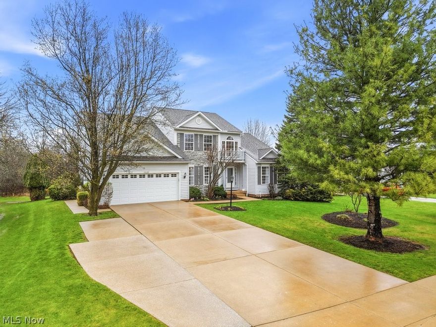 Beautiful TWINSBURG Colonial in GLENWOOD PRESRVE! FIRST FLOOR PRIMARY SUITE PLUS TWO STORY GREAT ROOM! Open foyer leads to home office, and formal dining room with tray ceiling. Stunning great room with dramatic wall of windows, back staircase, remote control custom window shades (2024) and stone gas fireplace. The kitchen opens to the great room and has stainless appliances, granite counters, maple cabinets, extensive recessed lighting, built in wine rack, pantry closet and newer LVP flooring. Enjoy the upcoming coming months in your 3 season screened in sun room surrounded by windows that overlook the scenic private yard and patio that back up to wooded nature preserve. Vaulted primary suite has tiled bathroom with shower, tub and walk in closet. Also on the first floor is a spacious just painted laundry with washer, dryer wash tub and closet as well as a newly painted powder room. Upstairs are 3 additional bedrooms and a full bath with new window glass. Finished basement has built in bar, pool table, half bath and storage room. Roof is approximately 8-10 years old. Trane furnace and A/C are about 8 years old and were just serviced. Water tank in 2019. Lighted ceiling fans in great room, sun room, primary bedroom and 2 upstairs bedrooms. All toilets replaced in 2024. Most of the interior rooms were recently painted, Garage has access to attic with pull down stairs, large custom cabinet and includes an easy care Polyaspartic floor. Concrete driveway has an extra pad addition. The current owner has spent the past 20 years living in this wonderful neighborhood and will be sad to say good bye. They enjoyed the convenience of walking to neighborhood playground as well as the close proximity to the schools, library, shopping, restaurants and highways. Their kids spent lots of time at the Twinsburg Water Park and the Twinsburg Community Center. They also loved to play at the nearby parks and looked forward to the Twins Day Festival every summer. Home warranty!