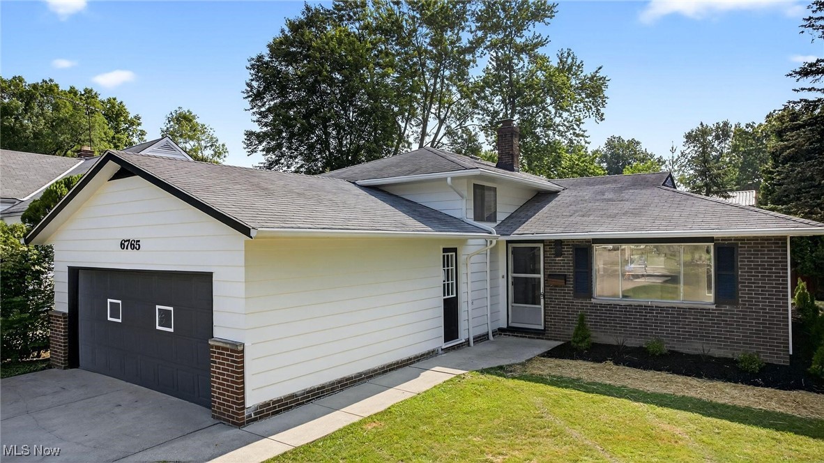Welcome to this well maintained, fully renovated. split level located in Solon! Large, inviting foyer welcomes guests and flows to a huge living room! A large window fills the room with natural sunlight that streams into the dining room. With an open kitchen concept. The spacious eat-in kitchen is off the dining room has plenty of cabinets. Upstairs you will find 4 bedrooms including your master bedroom! And a full brand new bathroom!! The lower level has spacious family room, new full bath and laundry area. The beautiful back yard has brand new concrete patio with room to relax or play on summer days. Just moments from the schools, the community center, community pool and all the conveniences that Solon has to offer.