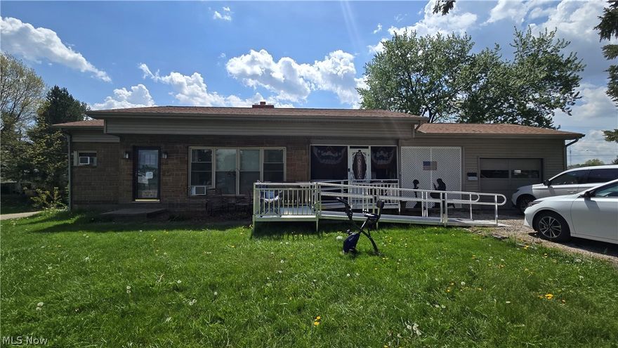 This ranch-style home in Alliance offers a unique opportunity with over 2,100 total sq. ft. of living space. The main level features a functional layout, while the fully finished walk-out basement doubles the footprint, complete with its own kitchen, bathroom, and stove. Key updates include a 3-year-old roof, a 2-year-old water heater, and a newer main stove (under 6 months). The home is powered by gas heat with a high-quality furnace. Features a single attached garage. Ready for your personal touch with paint and flooring!