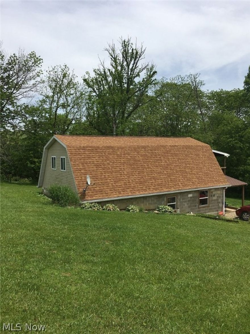 Secluded home on 5 acres. Partially finished and plumbed for half bath on second floor. Two bedrooms upstairs, master with walk out deck. Living room, dining room, kitchen comp. on ground floor. Pole barn. Wood stove does not convey. Restrictions apply.