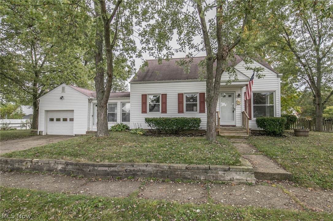 Great Cuyahoga Falls Cape! Ready to move in with fresh paint, and pretty oak floors. There's a breezeway between the kitchen and garage. Garage has new door opener. Newer siding, windows, and garage door. The second floor master bedroom has a walk-in closet and built in bookcases. The basement offers waterproofing, high efficient furnace, glass block windows and new structural steel beams. Beautiful extra space on both sides of the house plus a private area on the back side of the breezeway that would make a lovely private patio area. There are short sandstone retaining walls at the front and planter beds at the side of the garage. Call for your private showing today!