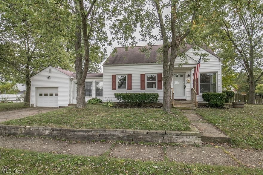 Great Cuyahoga Falls Cape! Ready to move in with fresh paint, and pretty oak floors. There's a breezeway between the kitchen and garage. Garage has new door opener. Newer siding, windows, and garage door. The second floor master bedroom has a walk-in closet and built in bookcases. The basement offers waterproofing, high efficient furnace, glass block windows and new structural steel beams. Beautiful extra space on both sides of the house plus a private area on the back side of the breezeway that would make a lovely private patio area. There are short sandstone retaining walls at the front and planter beds at the side of the garage. Call for your private showing today!