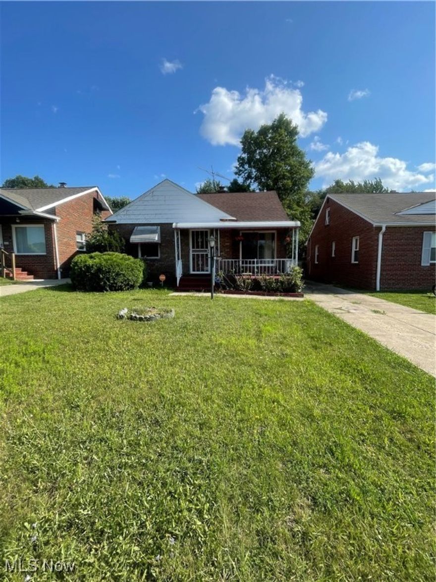 Nice brick home, with 3 bedrooms, 2 bedrooms on the main level and 1 nicely sized bedroom on the upper level. Upon stepping onto  a large porch area for relaxation, you will enter into the home through the living room and eat in kitchen, which are all located on the main level of the home. Large, finished basement with a bar area, bathroom and plenty of space. Two car detached garage and plenty of opportunity to remodel the home for your liking, great renovation project, great for an investment opportunity or for rent.  Schedule a showing today and make your offer