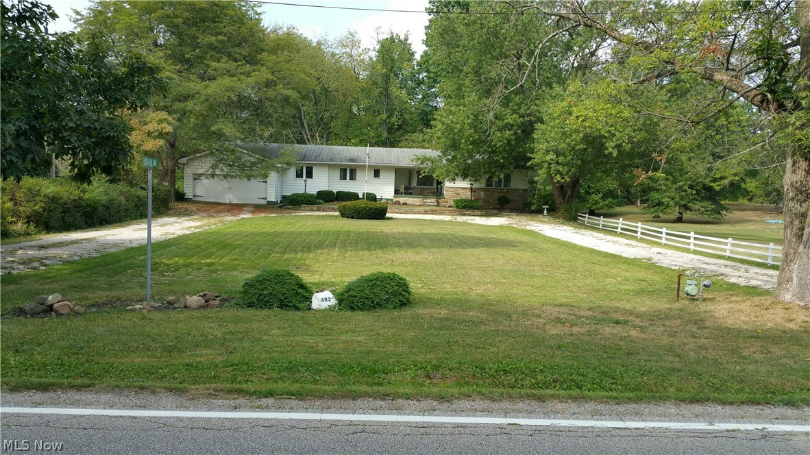 2100 Sq Ft Ranch in Tallmadge Ohio. With a Deep 3/4 acre lot, wooded, private, centrally located close to shopping, dining, schools and route 76. There is a lot with this home. 4 Bedrooms/2 Fulls baths, Full Basement partially finished and as big as the first floor too. A turn around driveway, pull through garage, back patio, basketball court and back deck with a big fireplace. The kitchen is very large with a bar and eat in area. There is a lot here that is on your list of requirements. With some updating you have an opportunity to make this home your own. Call today for your private showing and dont miss out on a Tallmadge Ranch home.