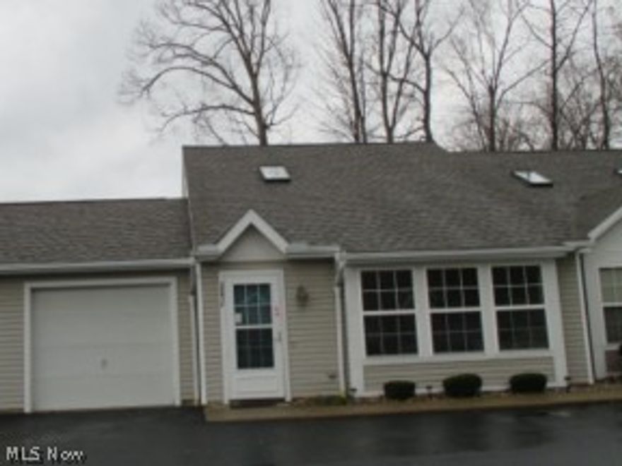 2 bedroom condo with upper loft area that could be 3rd bedroom...first floor and second floor bathrooms, 1 car attached garage, vinyl fence around patio.