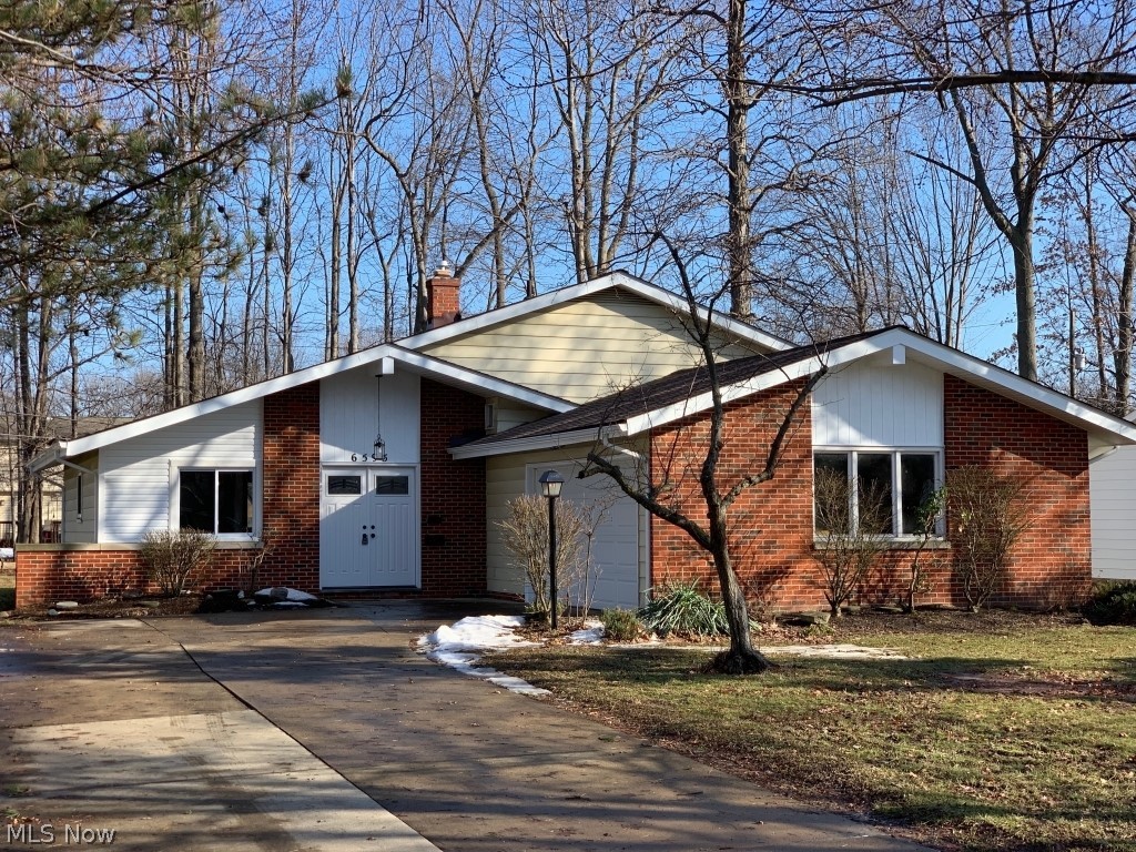 Beautifully renovated HGTV inspired split level home with 3 bedrooms and 1.5 baths. You will love creating memories and meals in this open floor plan with vaulted ceilings. The newly remodeled kitchen complete with all new appliances was designed to please the cook and invite guests. The home has a brand new roof, gutters, soffits and downspouts, and new windows. Both baths have been remodeled, the main bath has double sinks. There is all new flooring throughout. Laminate, tile and carpet. All bedrooms have been redone, fresh, neutral, modern paint throughout with white trim, this one is a MUST SEE!