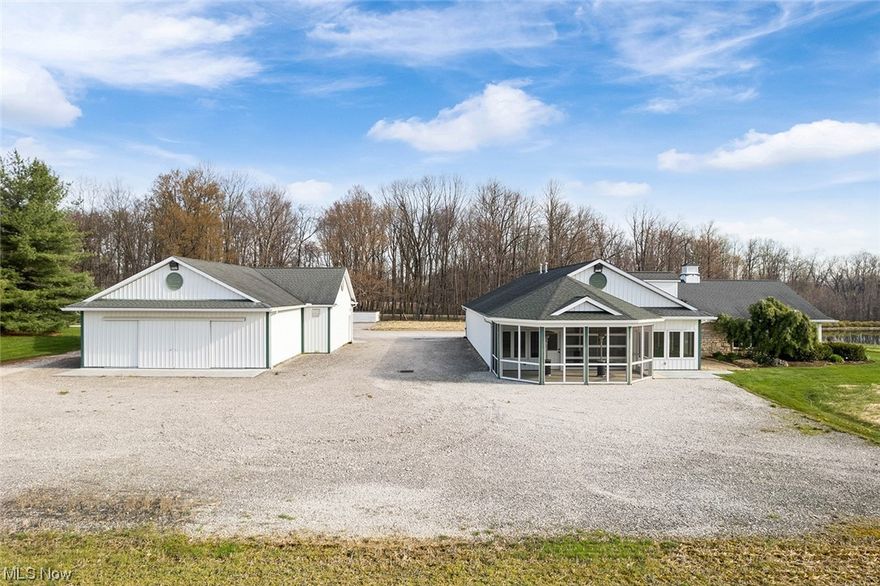 75-Acre Country Estate - Elegant Home - Private Setting - Scenic Lake - Guest House & 8-Stall Horse Barn - Tennis/Pickleball Court - Pool - Walking Path - Free Gas - Solar Panels - Offered In 3 Parcels & In Entirety - Live On-Site Auction - Sellers are downsizing. ABSOLUTE AUCTION, all sells to the highest bidders on location. ONLINE AND LIVE ON-SITE BIDDING WILL BEGIN SATURDAY - MAY 27, 2023 - 10:30 AM, REAL ESTATE SELLS AT 11:00 AM. Real Estate: Highlights include a grand foyer entrance that leads into a vaulted ceiling great room with a fireplace and loads of natural light. The open concept continues into the gourmet kitchen, dining area, and sunroom also with plenty of natural light and spectacular views of lake and farm fields. Spacious master suite with fireplace, private bathroom, and walk-in closets. The office, guest bedroom, full bathroom, and laundry room complete the main floor. The second floor features a large guest room, full bathroom, and an office. The finished basemen