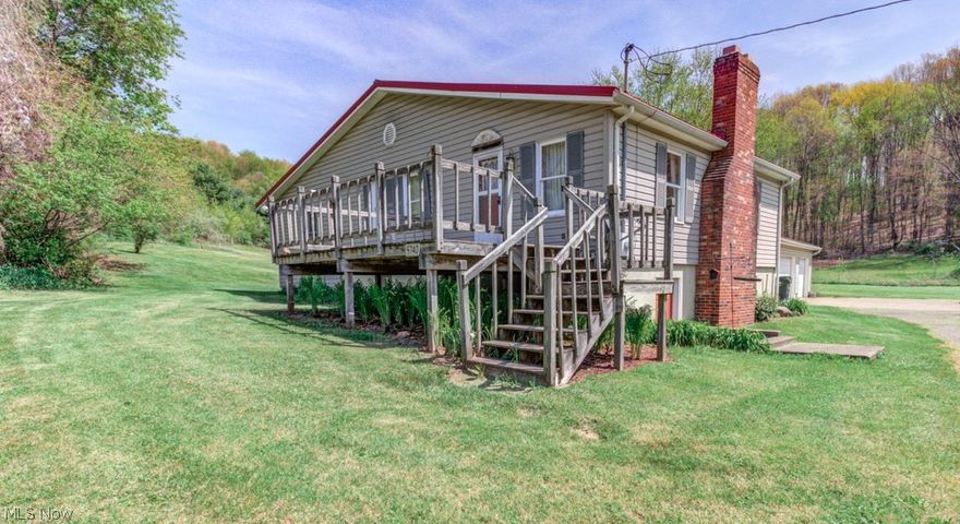 Beautiful property on 5 acres in Minerva School District.  The property has a 20X40 barn with pasture for animals along with a pond with bluegill and bass.  The detached 3 car garage with electricity offers plenty of storage space and room for vehicles.  There is plenty of outdoor living space to enjoy the serene property with a front deck and a back patio area.  Metal roof is only 6 years old.  The home is currently a 2 bedroom house with room for more bedrooms in the basement.  Cathedral ceiling family room has been added for additional living space.  The kitchen is large with plenty of cupboard and counter space.  The living room with a wood burning fireplace is spacious with nice natural light.  Furnace and Central Air are 8-9 years old.  This is an amazing opportunity in Minerva, you don’t want to miss out on it.