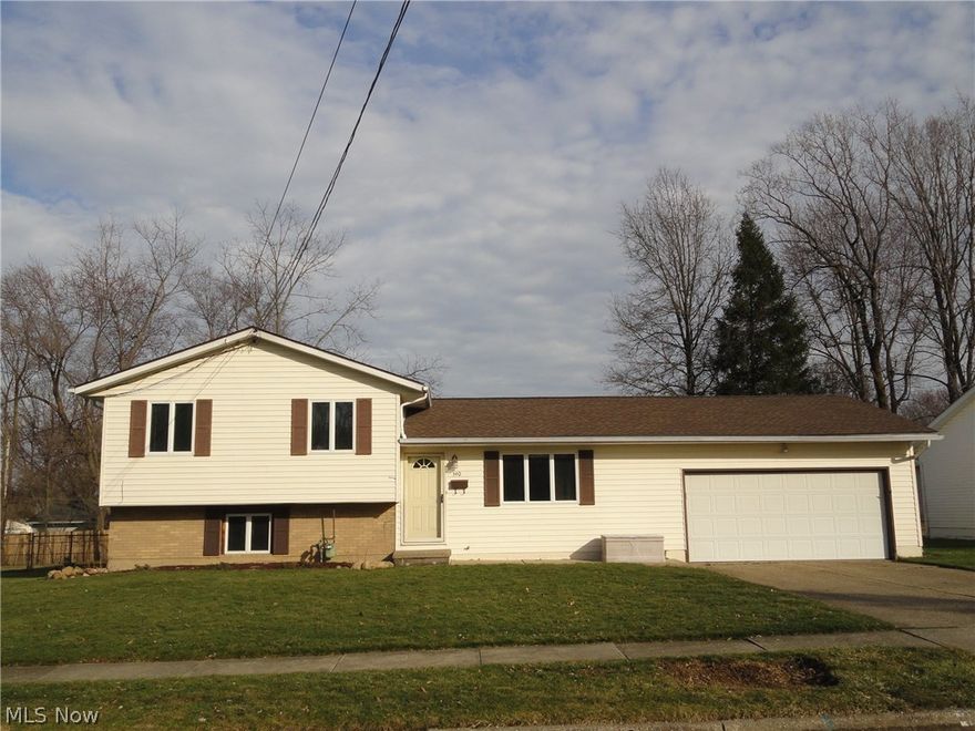 Impressive split level with family room addition situated in desirable Munroe Falls neighborhood within a short distance to the elementary school.  Very well maintained throughout.  Spacious L shaped living room and dining area which is open to the kitchen, breakfast bar and the 24 x 13 family room addition.  Beautiful gleaming hardwood floors throughout, gas fireplace plus built in cabinets and shelves.  Fully fenced backyard with 10 x 10 quality built shed,   16 x 16 deck porch,  12 x 12 screened gazebo and  Boise speakers for  exterior surround sound.  Convenient first floor laundry plus 1/2 bath.  3 bedrooms up, also with hardwood floors.  Lower level rec room plus utility room. Anderson wood clad casement windows, new water heater & dishwasher in 2016.  New roof in 2011, new furnace and AC in 2006 with Aprilaire humidifier and electro static air cleaner.  Move in ready!  Call today!