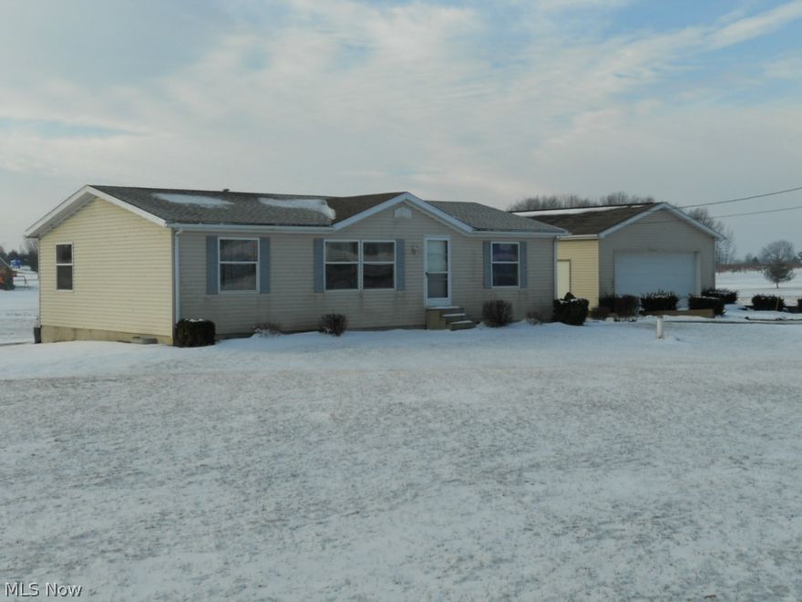 Located only minutes from Wooster in a rural setting we are offering at public auction this home situated on 2.008 acres. The home is a 2000 manufactured home sitting on a full basement and has been rendered to real estate. Home consists of 3 bedrooms, 2 full baths, kitchen, living room, laundry room and a full unfinished basement. Utilities include propane forced air heat with central air, water well and septic. The parcel is relatively flat with a 30x24 detached garage and ample room for a pasture.