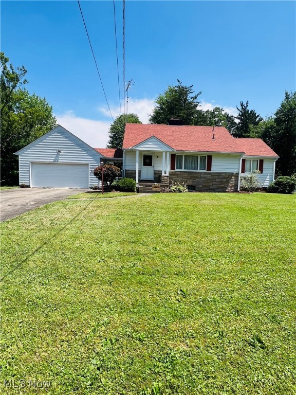 This 4 bedroom, two full bath home sitting on large lot in a very quiet neighborhood is waiting for you. This very
clean home is close to schools, stores and a lot more. Home has been very well taken care. The first floor
consists of the kitchen opening up to the dining area, large living area with fireplace, one bedroom currently
being utilized as laundry room, full bathroom and big master bedroom. The second floor has two additional
bedrooms and another full bathroom. The home sits on a nice corner lot and also includes a detached garage
with covered walkway from garage to the home. Come take a look.