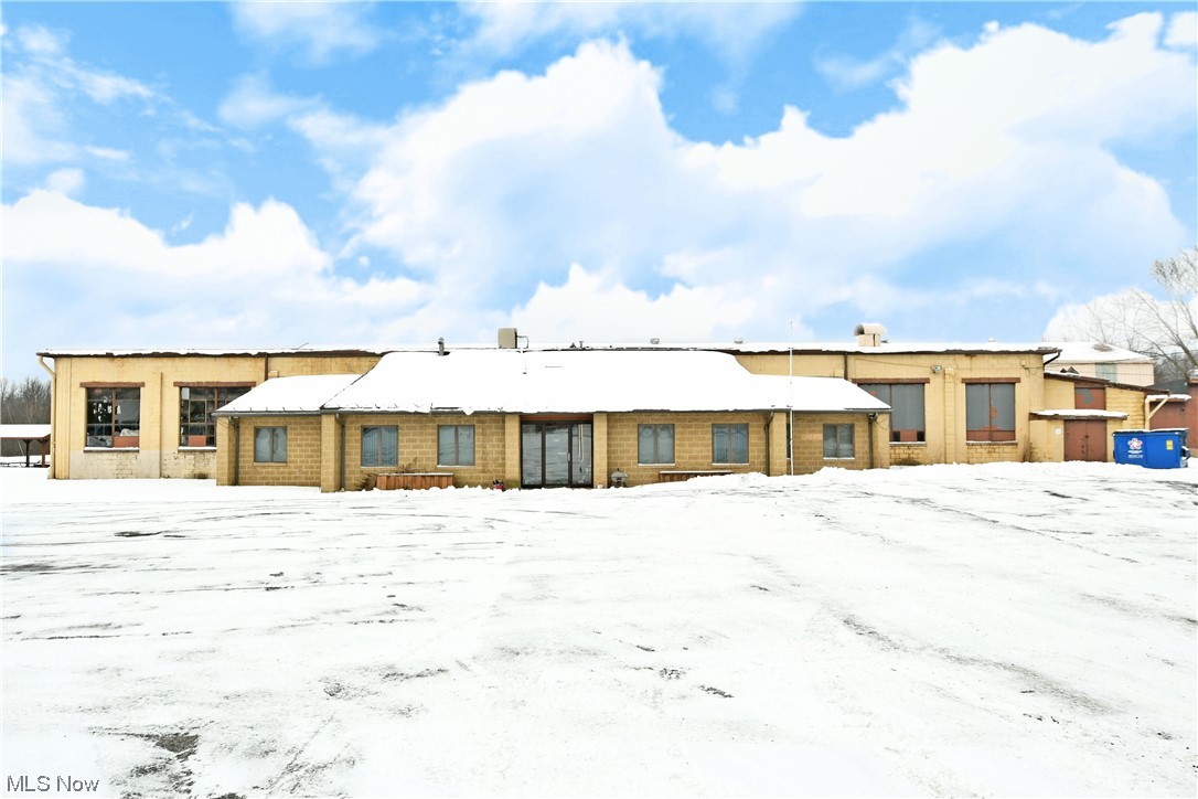 Buildings on the property have the following dimensions: 228X176, 82X50, 40X28, 73X111. Are you looking for a totally unique business opportunity with tons of available space and land to develop? Look no further as this must-see Liberty Township offering holds all the potential and more! Uniquely located and able to be paired with additional nearby acreage; this former steel stamping and production facility showcases a massive footprint that includes all the current machinery and processing equipment alike. Industrial grade metal brakes, shears, lathes and more are all found on-site of this surprisingly viable package. Multiple overhead crane assemblies join equally substantial truck access points for both shipment and deliveries of raw goods and finished products alike. Notable additions are a large central paint booth with an automated dipping basin, large commercial grade air compressor and vacuum pump assemblies, a small machine shop and rear offices that oversee the multi-tier layout of the main building. A front end with additional office space, bathrooms and more keeps daily operation. Two other oversized outbuildings allow for easy storage or available space for subletting as needed. An included home with a wrapping, mobility friendly patio accompanies the property along with an offset swimming pool to capture a sustainable live-in-business venture.