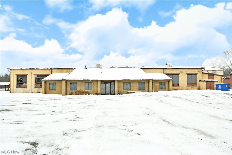 Buildings on the property have the following dimensions: 228X176, 82X50, 40X28, 73X111.  Are you looking for a totally unique business opportunity with tons of available space and land to develop? Look no further as this must-see Liberty Township offering holds all the potential and more! Uniquely located and able to be paired with additional nearby acreage; this former steel stamping and production facility showcases a massive footprint that includes all the current machinery and processing equipment alike. Industrial grade metal brakes, shears, lathes and more are all found on-site of this surprisingly viable package. Multiple overhead crane assemblies join equally substantial truck access points for both shipment and deliveries of raw goods and finished products alike. Notable additions are a large central paint booth with an automated dipping basin, large commercial grade air compressor and vacuum pump assemblies, a small machine shop and rear offices that oversee the multi-tier layout of the main building. A front end with additional office space, bathrooms and more keeps daily operation. Two other oversized outbuildings allow for easy storage or available space for subletting as needed. An included home with a wrapping, mobility friendly patio accompanies the property along with an offset swimming pool to capture a sustainable live-in-business venture.