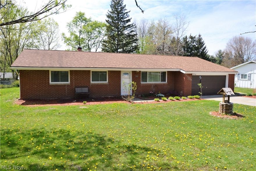 This home has recently been redone from top to bottom. New New New is all there is to say. In 2014 the windows, gutters,  vinyl siding was added on gables and soffits with soffits replaced, Furnace and Air conditioning also replaced in July 2014. Exterior doors in 2014. Bathrooms updated in November 2014. Interior doors, new carpet, new flooring and baseboards, all new kitchen cabinets, granite counter tops in kitchen and freshly painted throughout...all in 2016. Newer fire door between kitchen and garage and newer man door as well. Patio and back yard access from sitting room located just off the space saver kitchen with built in laundry closet.  Great location on West side of Valley View with extra parking or turn around area off side of concrete driveway. Located just minutes from I-271 for Akron, Cleveland access. Between Highland and Twinsburg Roads.
