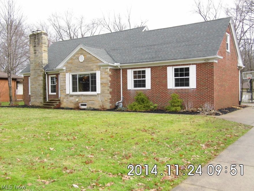 Awesome home with 4 Bedrooms, 2.5 Baths, In Law Suite with Kitchen AND Finished Basement! This is the perfect layout home, 3 Bedrooms up with large full bath & first floor bedroom with full bath (shower) with own living space, separate entry from back of home and yet convenient to the rest of the home, it even has a kitchen too! Main floor has large kitchen, separate 45 day contingency. Dining Room with great space that opens to a huge Living Room! Finished basement with fireplace & plenty of room for both a media room / recreation room & LARGE Family Room plus bonus exercise room & laundry room! Garage is large w/ 2 separate garage doors, entry from back allows for plenty of parking and great curb appeal! Rear yard is fully fenced for pet friendly living & peace of mind for playing. Natural hardwood throughout, ceramic tile & fresh basement carpet! Lots of charm and updates in this brick home with newer dimensional roof, high efficient furnace, central air conditioning & newer windows