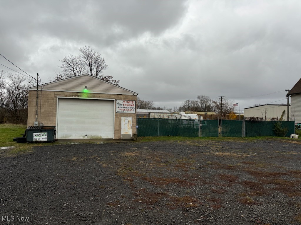 INVESTORS OR FUTURE BUSINESS OWNERS, NOW IS YOUR CHANCE!! 5 LOTS FOR 1 LOW PRICE, WHAT A DEAL!! Schedule your private showing today to see what these buildings and lots have to offer!
Per owner, "lot size for the building is 100 ft wide by 160 ft deep 150 next door is like 150 ft wide and 160 ft deep and it's three lots on that side and it's all light industrial property deep and there is an oil seperator 1,000 gallon on side for the shop has a new roof about 4 years ago and has gas heat with reznor on the ceiling and a 200,000 BTU forced air in the rear building is 30 ft wide by 66 ft long was built in 2000.
It was a former auto sales, auto service & impound lot. Car lifts & equipment negotiable.