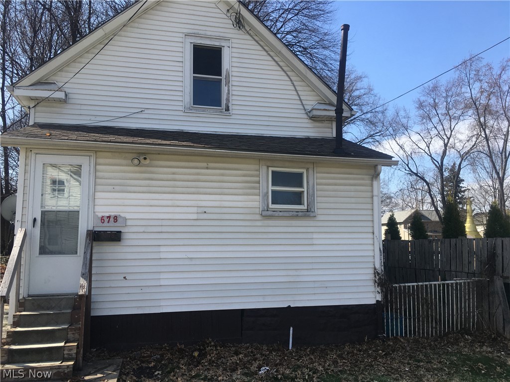 Two bedroom home located near the university. Shared yard with front two unit. Home has foyer with laundry hookup, kitchen, dining room, first floor full bathroom and living room. Home freshly painted. The upstairs has two bedrooms. Shared drive way. Tenants pay gas and electric. All interested parties to apply online with a $50 application fee per adult.