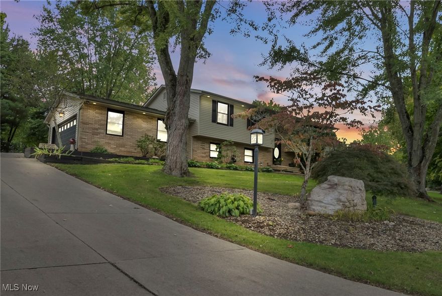 Look no further! This beautiful bi-level home is move-in ready and located at the end of a peaceful cul-de-sac. Featuring 4 bedrooms (auditor shows 3) and 2.5 bathrooms. The home boasts elegant crown molding throughout the kitchen & upstairs living area and an oak kitchen filled with thoughtful features and tons of storage. For cooking enthusiasts, the kitchen includes a hidden KitchenAid lift, full pantry with shelving, a bread box, breakfast counter with stools, and much more! All kitchen appliances are included in the sale. The home is beautifully lit, with recessed lighting, dimmer switches, and step lights all installed by the homeowner, who is an electrician. This has created a stunning ambiance outside with dusk to dawn lights around the exterior, on the sheds and all throughout the interior. The upper level has 3 bedrooms and a full main bathroom. The master features a master bathroom and balcony. Large living space and large front window for natural lighting. The lower level offers a cozy family or entertainment room with a built-in bar, stools, and a wood-burning fireplace. Plus a 4th bedroom with two closets, a hall closet (containing two updated small pressure tanks under the steps), a half bathroom, and a laundry/utility room that leads out to a heated garage! The property has a paved driveway for easy winter maintenance and two sheds with electric. They converted a gazebo into the 2nd shed closest to the house in (2024) for extra storage. The backyard is perfect for entertaining & it even has a treehouse! Mechanical updates include a new roof (2011), siding (2001), furnace and A/C (2020), hot water heater (2021), aeration lift pump for septic (2024), and an updated well (between 2015-2017). Don’t miss out on this incredible home with so many updates! ONE YEAR HOME WARRANTY INCLUDED! Contact us or your favorite agent today to schedule a private showing! Showings are by appointment only for pre-approved buyers. Kindly refrain from disturbing the sellers.