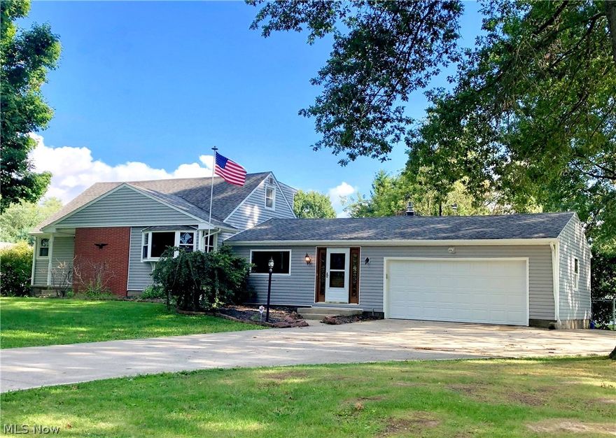 Great location with this Jackson Township home on nearly half acre lot!  Beautiful fenced backyard with large heated storage barn (24x14) includes 100 amp electric, gas furnace, attic and more.  Spacious room sizes here, family room with fireplace, gas logs sliding door to sun room and newer deck.  You'll love the updated kitchen with solid surface counters, tile back splash, appliances and beautiful cabinets. Two bedrooms on first floor and two bedrooms finished upstairs with new carpet.  Seller has made recent updates including; roof, windows, siding, deck, HVAC, kitchen, bath, some carpet, exterior motion lights and more.  As-Is, seller unable to make requested repairs. Make Offer!