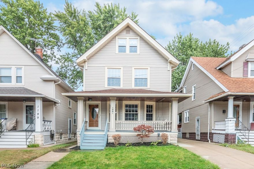Move right into this charming Western Lakewood Colonial.  This home features an eat-in kitchen with wood floors & Corian counters. Cozy living room w/ decorative fireplace & built-in bookshelves, spacious dining room w/ leaded glass china cabinets, renovated bath featuring double pedestal sinks, ceramic tile surround & floor. 3 bedrooms on 2nd floor & 4th bedroom on the third floor.  Full bath in basement, large front porch & covered deck overlooking fully fenced yard, roof 07, vinyl windows, vinyl siding, central air 09, updated electrical, glass block, newer driveway, garage opener.  All Appliances & 12-Month Home Warranty Included!