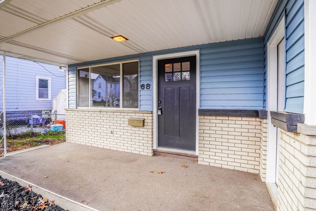 Photo of 68 25th Street NW, Barberton, OH 44203 (MLS # 5174237)