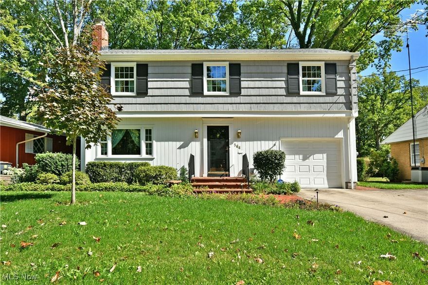 Are you looking for a potential packed, move-in-ready home set within a great Warren neighborhood? Don’t miss your chance on this remarkably well kept offering to feature three floors of finished living space! Great looks are sure to draw you in, beginning with the stylish, two-toned exterior accented by dark shutters and a lovely brick walkway leading to the front door. A single car attached garage is brightly lit, bringing man-door access to a must-see rear deck space that overlooks the lush backyard. Through the front door, a spacious living room takes advantage of large picture window, helping to illuminate the brick lined fireplace sat along the far wall. Rich, green carpeting runs underfoot as it extends around the corner and into the window lined dining room with instant deck access. Nearby, revel in the handsome kitchen, filled with stained wood cabinetry. Eat-in dining space offsets a cozy half bath before basement and garage access. Upstairs, you’ll find an oversized master bedroom suite that delights with hardwood flooring and advantageous built-in shelving. A full bath is located aft of a dressing room or office area. Down the hall, a second, larger full bath brings colorfully tiled walls as it joins the trio of remaining guest bedrooms, bringing the total count to four. Laundry service is found at the basement level where wood paneled walls make for an easy rec area.