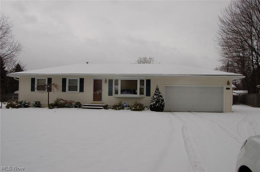 Vinyl Ranch 3 bedrooms, huge family room, full basement, 5 car garage, rec. room. Many updates including carpet, furnace & air conditioning, windows, kitchen, and bath all done recently. Nothing to do but move in! 2 car attached garage, 3 car detached garage.