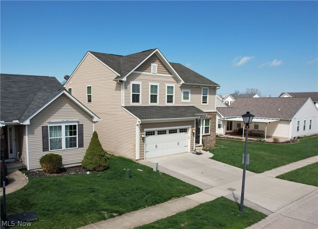 Photo of 6138 E Meadow Farm Lane, Lorain, OH 44053 (MLS # 5202419)