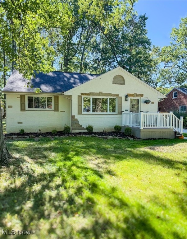 Welcome Home - 24407 Westwood Rd - A Completely Remodeled Ranch Retreat! This beautifully renovated ranch home offers the perfect blend of modern style and everyday comfort. Designed for easy one-floor living, every detail has been thoughtfully updated, making it truly move-in ready. Step inside to a spacious living room with stunning white oak wood floors that flow throughout the home. The dream kitchen features quartz countertops, sleek slate appliances, custom lighting, and a bright eat-in dining area. For larger gatherings, enjoy the additional formal dining space, plus a versatile bonus room that can serve as an extra family room, office, or playroom. Two luxurious full bathrooms showcase marble and quartzite finishes, while the convenient laundry room is complete with a new washer, dryer, and utility sink. The airy bonus room off the kitchen leads to a roomy- freshly stained deck—perfect for relaxing or entertaining. The list of updates is extensive: new roof, driveway, front porch, windows, glass block windows, gutters, AC, furnace, updated electrical, and fresh paint inside and out. The oversized side-loading garage has been fully refreshed with new concrete flooring, fresh paint, and a new opener. Set on a generous lot with mature trees, this home offers both beauty and privacy, all while being just minutes from Crocker Park, schools, and the hospital.
