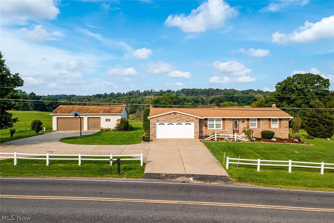 Clean Brick Ranch With 26x40 Garage/Shop - On-site Auction With Online Bidding Available On Real Estate - ABSOLUTE AUCTION, all sells to the highest bidder on location. ONLINE BIDDING BEGINS TUESDAY – OCTOBER 5, 2021 – 12:00 PM and AUCTION LIVE ON-SITE BIDDING WILL BEGIN FRIDAY – OCTOBER 8, 2021 – 10:30 AM, REAL ESTATE SELLS AT 12:00 PM. Real Estate: Clean brick ranch on .75 acres with over 1500 SF. The home features a formal living room, eat-in kitchen with sliding doors to a large deck, family room with gas fireplace, spacious master with private bath, two additional bedrooms, and full bathroom. Partially finished walkout basement with family room, plenty of storage, and workshop. Attached 2-car garage plus detached 26x40 heated shop building with 8x10’ and 16x10’ overhead doors, concrete floor, and 220V electric. New gas furnace in 2020. New whole home backup generator. Gorgeous views of farmland and rolling hills from the back deck! Very clean home! Stark Co parcel #7204141. Half-y