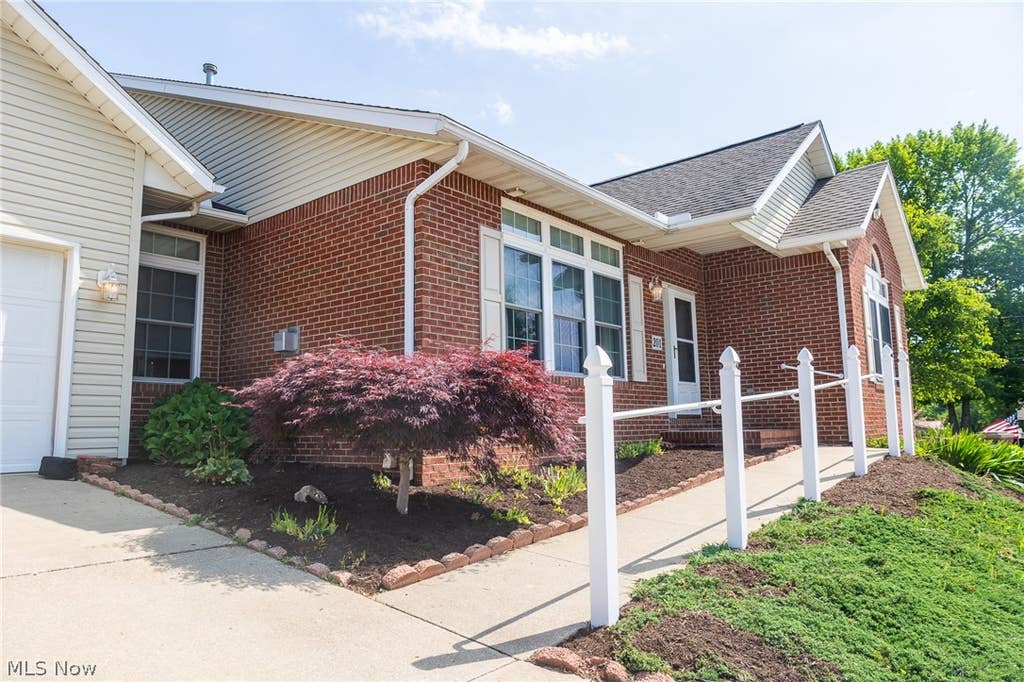 Photo of 201 Greenbriar Lane, Dalton, OH 44618 (MLS # 5216741)
