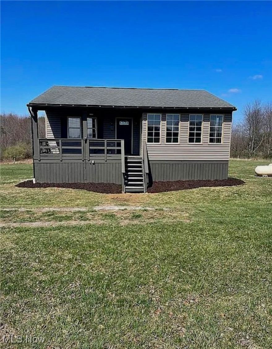 Welcome to this adorable and cozy 2-bedroom, 1 full bath home nestled on just a little over 6 acres of peaceful countryside. As you step onto the covered front porch immediately to the right you will find a sunroom with indoor/outdoor carpet. Recently updated throughout with a ceramic backsplash in the kitchen with butcher block countertops, and new stainless appliances.  Ideal space for expansion for added functionality or used as weekend getaway with hook ups for camping. Outside you will find a 1024 sq.ft barn and a 192 sq.ft shed making it ideal for those looking for extra storage. Access to 2 ponds for fishing and boating with Salt Fork lake and marina only 10 minutes away. Whether you're dreaming of a private family compound or something unique-this place has the potential to make it happen with plenty of room to grow, garden or relax. A Must See! call to schedule for a private showing!