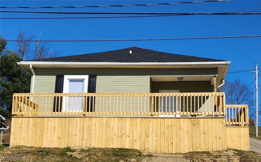 SIGNIFICANT PRICE REDUCTION FOR THIS LIKE "BRAND NEW" HOME! Sit high overlooking the City of Cambridge with awesome sunsets from the new front deck of this 3 bedroom, 1 bath home that has everything redone from top to bottom!  New roof, siding, shutters, doors, insulation, drywall, plumbing, electrical, lighting, flooring, hot water tank, cabinets, vanity, furnace/AC unit plus the basement stairs.  The open concept living room, dining/kitchen area (with recessed lighting) offers a large picture window and back kitchen door to the newly graveled parking area.  The 1st floor laundry is conveniently located in the hall near the bedroom.  The bathroom has a soaker tub and beautifully tiled tub/shower walls.  The partial basement is clean and freshly painted providing usable storage space.  3 CORNER LOTS allow plenty of extra room for parking or to build an addition, garage, carport or outdoor patio area for entertaining or even a play area for children.  Don't let this one pass you by!  MOTIVATED SELLERS! Schedule your tour today!