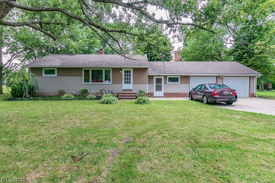 Beautifully landscaped remodeled 3 bedroom ranch in desired Kirtland. Large finished basement with adjacent laundry room.  Covered back porch overlooks 1 acre backyard. Two car attached garage.  House is situated on a quiet street walking distance to Farm Park.