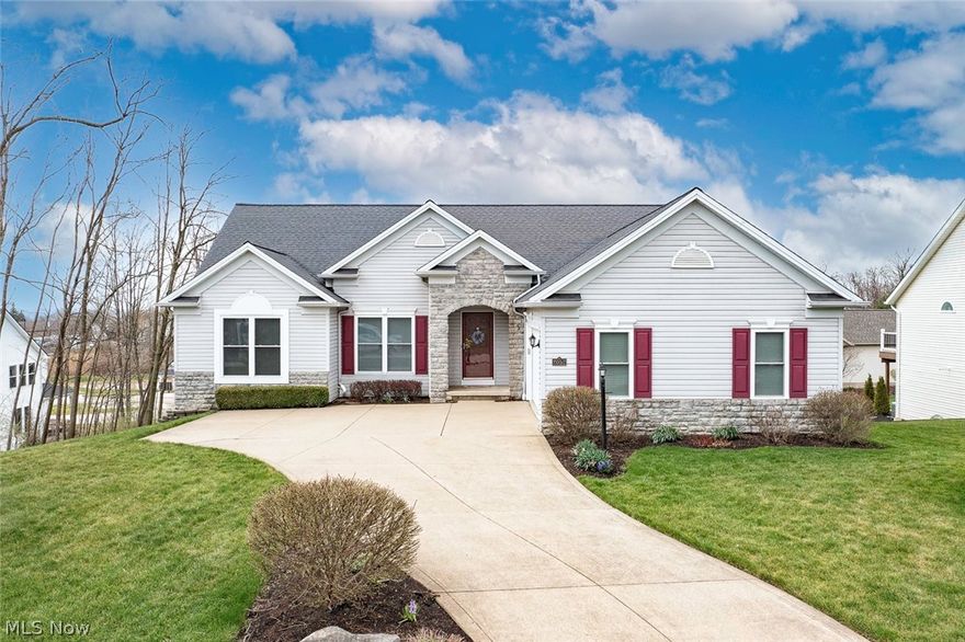 Welcome home to this meticulously maintained 3-bedroom, 2.5-bath residence offering 1,894 sq ft of open-concept living with vaulted ceilings on the main floor—plus an additional 1,894 sq ft in a beautifully finished walk-out basement.  The sun-filled kitchen is designed for both everyday living and entertaining, featuring ample counter space, stunning cabinetry, stone countertops, and newer stainless steel appliances. Step through the sliding doors to your multi-level composite deck—perfect for hosting gatherings or enjoying quiet outdoor moments.  The great room showcases a cozy gas fireplace, creating a warm and inviting atmosphere during the colder months. The spacious owner’s suite includes a walk-in closet and a private ensuite bath with a dual vanity, soaking tub, and separate shower.  Two additional bedrooms and a full bathroom are thoughtfully positioned on the opposite side of the home, offering comfort and privacy. A convenient first-floor laundry room provides added functionality and storage.  The finished walk-out basement expands your living space with newer carpet, a second gas fireplace with blower, a half bath, and a generous storage area—ideal for recreation, hobbies, or guests.  Recent updates provide peace of mind, including all new windows and patio doors (2020), a roof less than 10 years old, and recently replaced hot water tank, furnace, and A/C unit. The home also includes a transferable warranty through Ohio State Waterproofing.  Outside, enjoy a well-maintained lawn with an irrigation system and drip lines for flower beds, making landscaping effortless.  This home truly combines comfort, space, and thoughtful updates—ready for you to move in and enjoy.