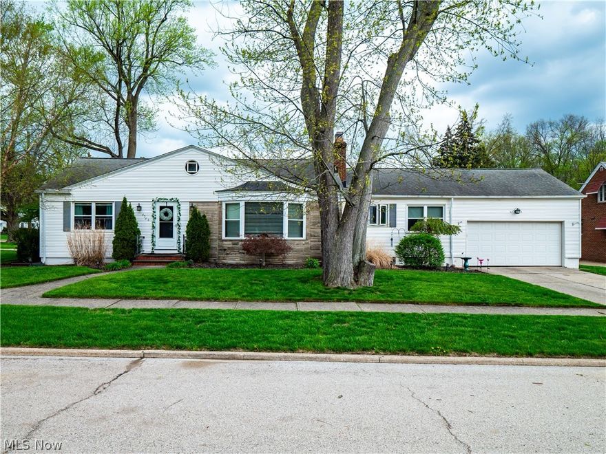 Look no further than this 3 bedroom, 2 full bath ranch ideally located near everyday conveniences! Enter into a bright living room featuring a bay window, cozy gas fireplace, and hardwood floors that flow seamlessly into the dining space. Just off the main living space, a tranquil sunroom overlooks the private backyard, perfect for relaxing year-round. The updated kitchen is designed with the cooking enthusiast in mind, offering a newer tile backsplash, SS rangehood and 36" range, plus a double pantry. All appliances stay!  Quietly tucked away on the opposite side of the house, find three comfortable bedrooms, full bath and large linen closet that can be closed off by a pocket door. Downstairs the partially finished basement provides additional living space along with a second full bathroom. Step out back to enjoy your morning coffee or entertain guests on the rear patio within a fully enclosed space featuring a wood privacy fence.  Additionally, the expansive side yard on this corner lot provides extra space for outdoor activities, while the home faces and loads off Parkdale Avenue for ease of living.  Completing the home is an attached two-car garage with Nature Stone flooring, and a built-in workbench.  All this, plus a home warranty for added peace of mind!  Open House Saturday, April 25th from 12pm-2pm!
