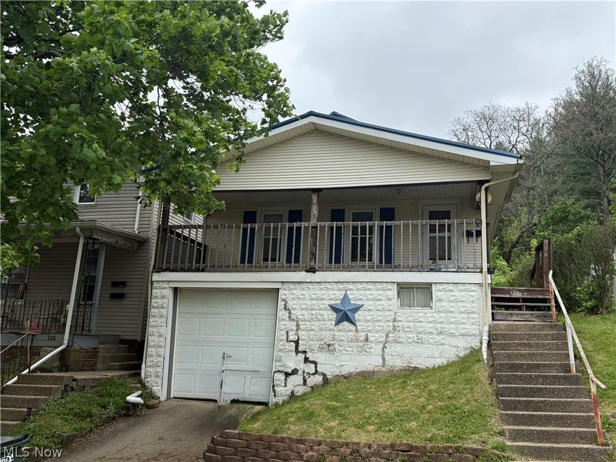 Investor Special with Functional Upgrades! This diamond in the rough at 306 N. 4th St. offers practical features that make it stand out: welcoming covered front porch, convenient alley access for easy entry/exit on one level into a mud room, modern walk-in shower recently installed, main floor laundry for single-level living convenience, and a one-car garage tucked under the home. Recent improvements include a metal roof and hot water tank—two major systems already handled. The property needs cosmetic updating throughout, making it an excellent opportunity for investors, flippers, or buyers with vision to create sweat equity.