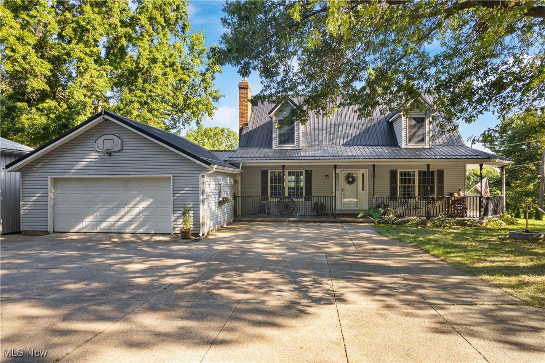 Country living at its BEST, on over 26 acres! The open-concept first floor features a two story great room w/wood burning stove and vaulted ceilings, custom eat-in kitchen w/pantry and access to the massive deck that overlooks the pond, laundry room, half bathroom, and a large master suite w/walk-in closet and attached full bathroom. Head upstairs to 3 additional bedrooms and another full bathroom. Newly renovated lower level has a giant rec room and walks out to the beautiful, private yard. The fully stocked pond features a sandy beach area and gazebo along with it's own private access road. Pole barn AND Livestock barn have both water and electric, and livestock barn has approximately 3 acres fenced in with an electric fence. Metal roof 2024. Everything else has been done in the last 9 years. FREE GAS! Schedule your private showing today!