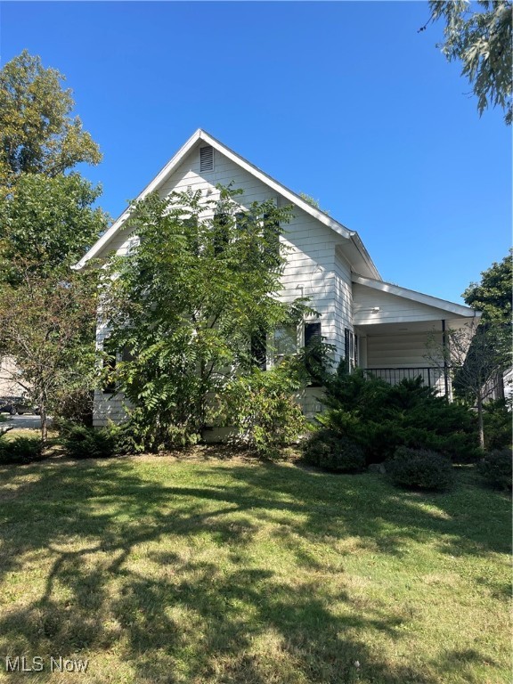 Investors! Great opportunity to own in the center of town. Large lot! Two car garage, plenty of parking space. Wheelchair accessible. The first floor has been gutted for your imagination. Can be a great opportunity for office space. The property was used for a dental office.