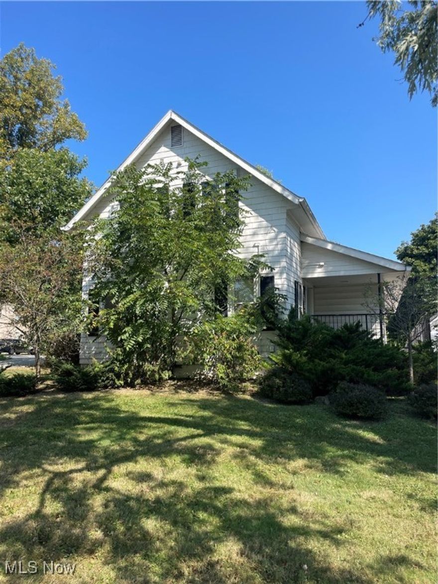 Investors! Great opportunity to own in the center of town. Large lot! Two car garage, plenty of parking space. Wheelchair accessible. The first floor has been gutted for your imagination. Can be a great opportunity for office space. The property was used for a dental office.