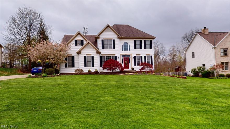 WOW....how about this Colonial located in the highly desirable Rolling Hills. This 5 bedroom, 4 bath home has a 2-car garage with spacious elegance, natural oak floors throughout, and a beautiful, large kitchen. In the kitchen you will find exquisite custom cabinetry and a beautiful layout for an amazing cooking experience. Once you have made your master chef meal you can take it outside and enjoy a meal on your gorgeous back deck or in your gazebo. Boasting a walk out basement you can truly entertain your friends and family in your new home. This home is absolutely stunning and wont last long in this market.... Be sure to schedule to tour this one ASAP!