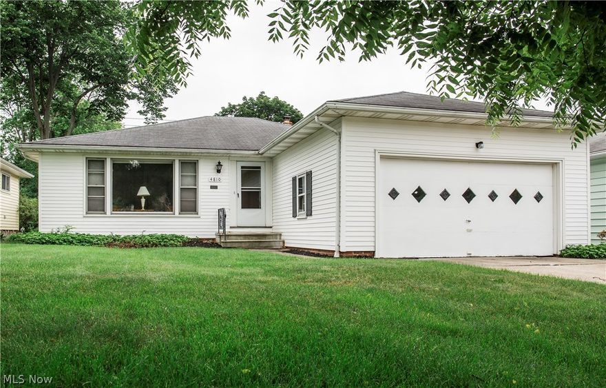 Fantastic Ranch in close proximity to EVERYTHING! Freeways, shopping, entertaining, hospitals, local community pool, parks, schools  etc.  Easy maintenance with the one floor living.  Oversized living room opens to formal dining area offering hard wood floors.  Lots of windows allowing for much natural light. These homeowners did it right when they opened up and remodeled this kitchen, large center island with bar stools, loads of storage cabinets and counter space. We all know when company is over the kitchen is the heart of the house and conversation room, entertaining and cooking will be enjoyed by all here. It is a rare find to see a kitchen this big, tucked off the side but not losing any floor space is a half bath for guests.  The attached garage enters right into the kitchen, carrying the groceries will be less than handful of steps from the car to kitchen.  3 bedrooms tucked down the back hall and the second bedroom used as a office offers rear door to deck.  Lots of closet spa