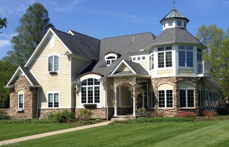 Custom built, nautically inspired home in the prestigious, private, gated lakefront community of Lakehurst. Enjoy lake views from two stone patios, Brazilian cherry wood floors, marble gas fireplace and two sets of French doors leading to stone patio. Windows abound in dining room with coffered ceiling. Eat in kitchen, granite countertops & island, cherry breakfast bar and custom cabinetry. Two first floor master suites with large closets, full baths, and patios. Main master bath has a Jacuzzi tub, ceramic shower, and spacious laundry room with skylights. Two more bedrooms upstairs with "Jack-n-Jill" full bathroom. Loft bonus room and entertainment room with a large high-definition, stereo, flatscreen TV. High ceilings throughout entire home - ranging from 12 ft. to 20 ft., including 12.5 course basement (currently unfinished, but huge potential for build out due to generous ceiling height). Heated 3-car attached garage with custom shelving. Two high-efficiency furnaces and air conditi