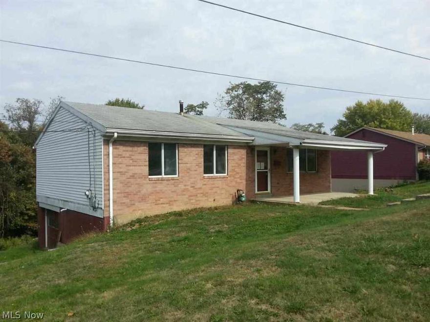 Ranch style home with 3 BR 1 bath. DR has sliding glass doors to enclosed sun room. Full basement could be finished into a rec room.