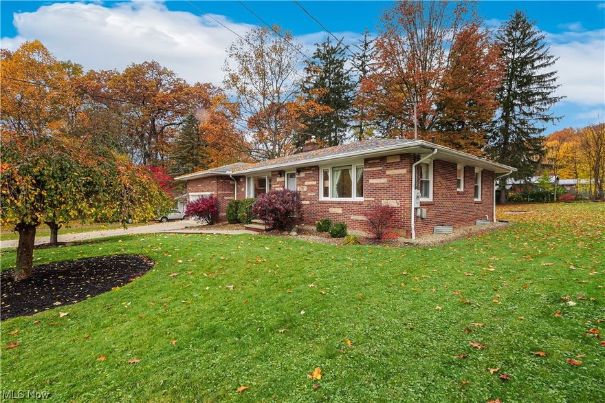 Welcome to your dream home in the heart of Fairlawn! This stunning brick ranch is the perfect blend of classic charm and modern comfort and located on a beautiful tree-lined street that culminates in a quiet dead end.  As you step inside, you'll be greeted by a warm and inviting living room featuring a cozy fireplace and tons of natural light, highlighting the rich hardwood floors that run throughout the home.  One of the standout features of the home are the vaulted ceilings in the family room and kitchen, lending a spacious feel and making them perfect for entertaining friends and family. You will enjoy cooking in the chef's kitchen with ample counter space and beautiful cabinets, and dining with a picturesque view of the lush backyard.  Three bright and comfortable bedrooms and a spacious full bathroom complete the main level of the home.  The partially finished basement is a fantastic bonus, providing additional living space and versatility. It features a large laundry room, an additional full bathroom, and a large recreation room with another cozy fireplace, perfect for family gatherings, movie nights, or a game room.  This Fairlawn gem is ideally located, providing easy access to the area's top schools, parks, shopping, and dining. Plus, you'll have convenient access to major highways, making your commute a breeze.  Schedule a showing today and experience the perfect blend of comfort, elegance, and tranquility in Fairlawn.  Your dream home awaits!